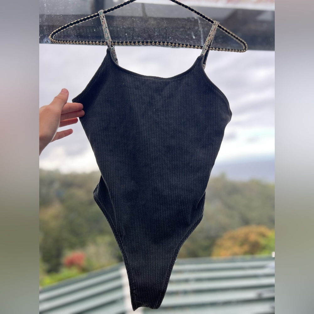 Sexy little one piece tank top. Cheeky leotard.